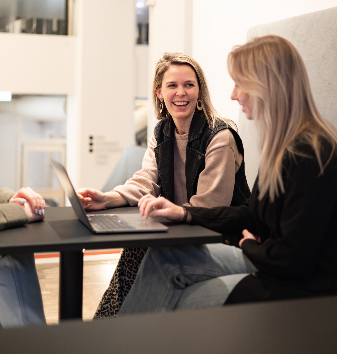 Two colleagues reviewing recognised companies in LeadBot
